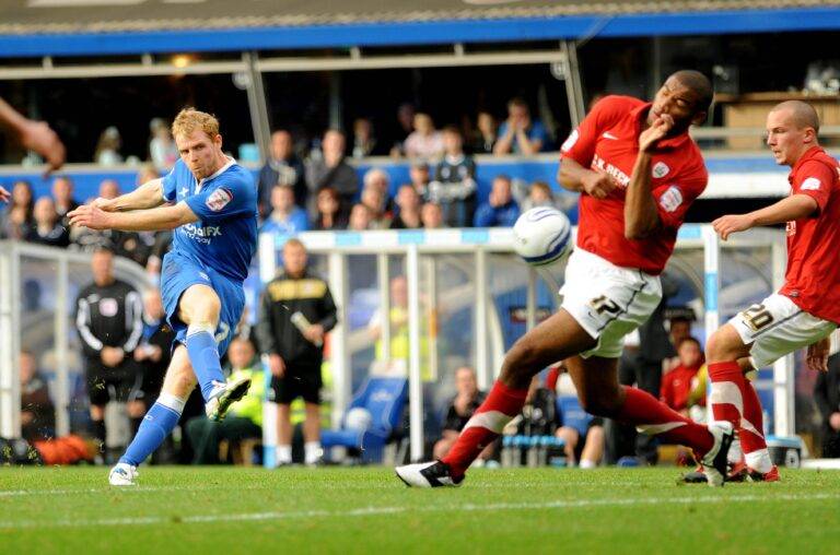 Blues winger Chris Burke scoring against Barnsley