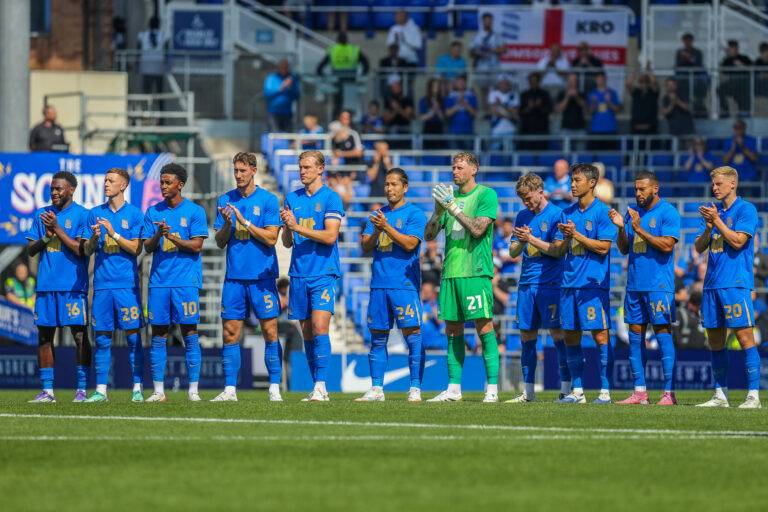 The Blues team applauds in tribute to Trevor Francis against his former club, Nottingham Forest