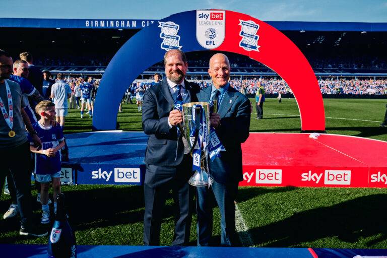 Andrew Shanahan and Tom Wagner with the League One championship trophy
