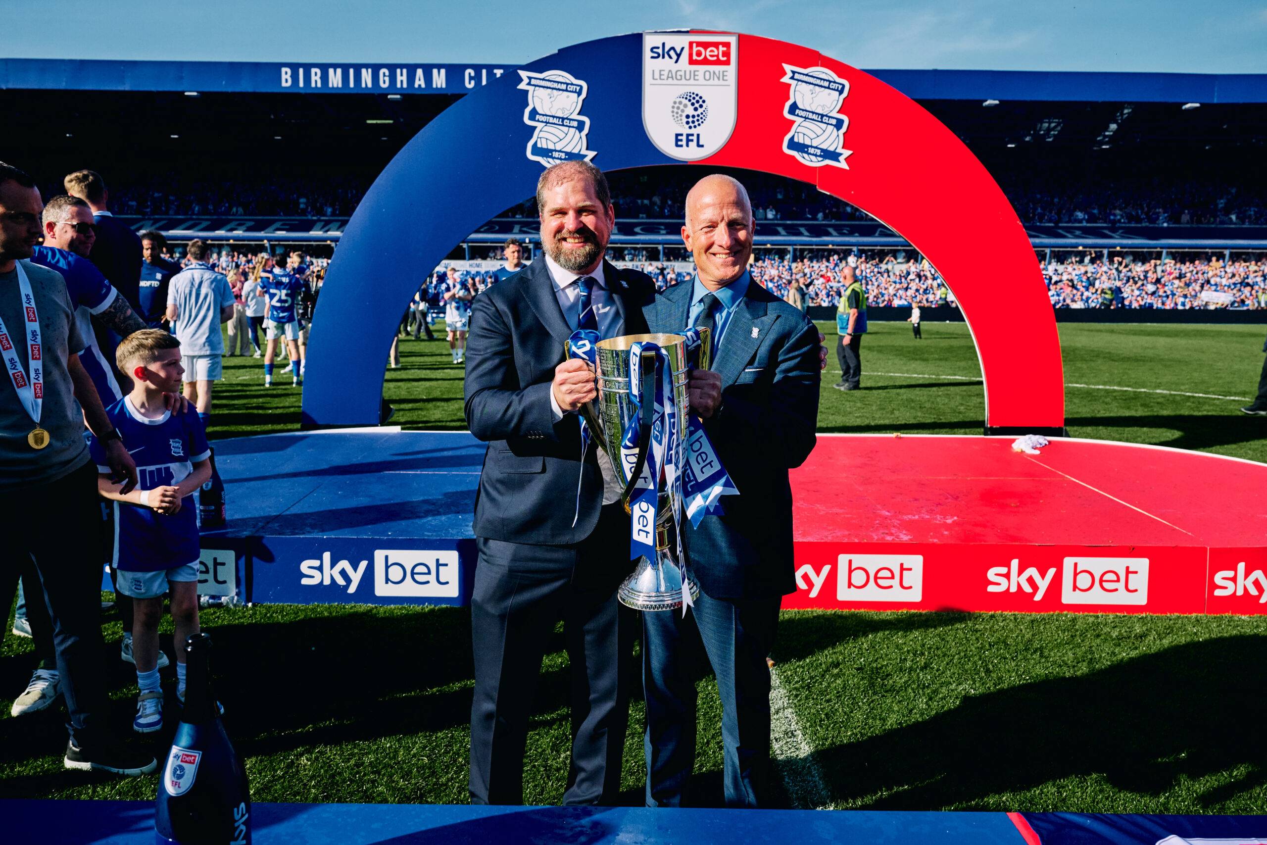Andrew Shanahan and Tom Wagner with the League One championship trophy
